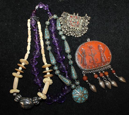 Collection of African costume jewellery & string of amethyst beads